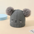 Baby Strick-Wintermütze mit Bärenbommeln
